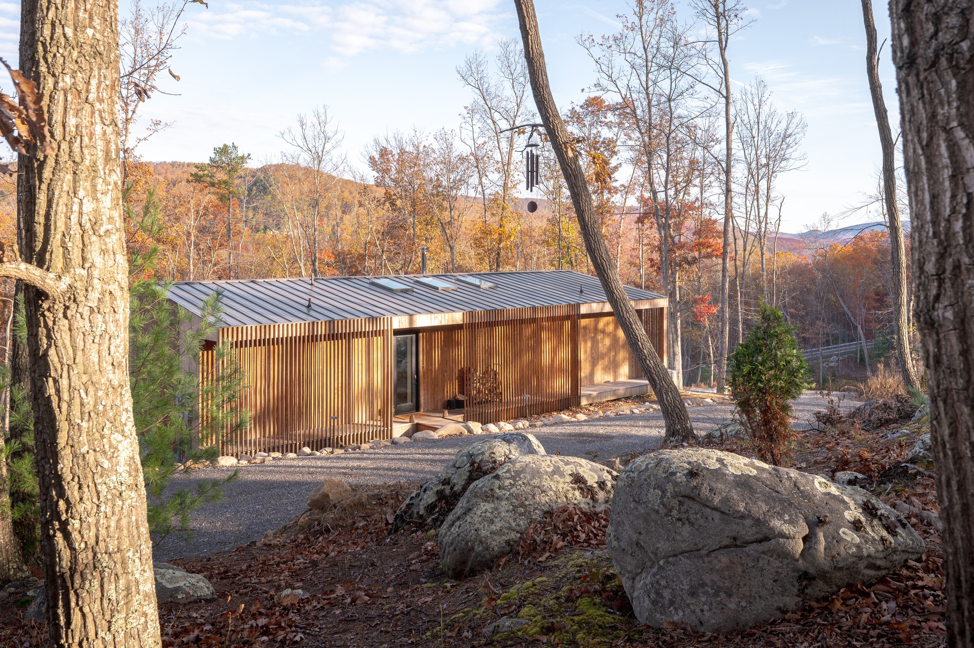 Exterior view of Sera project villa in West Virginia featuring rhythmic wood slats and sustainable Carbon Smart wood cladding.