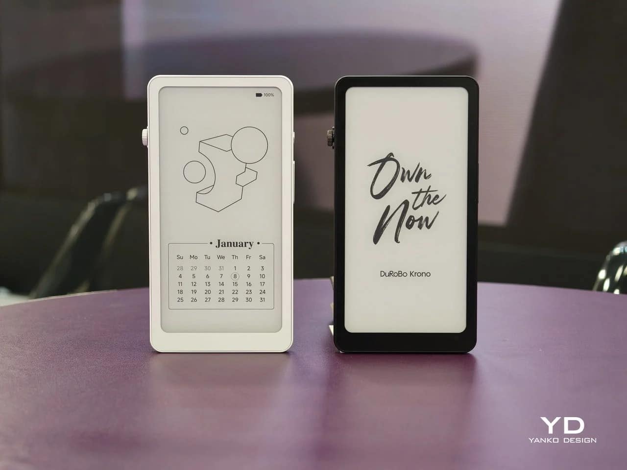 Comparison of white and black DuRoBo Krono models standing vertically on a table.