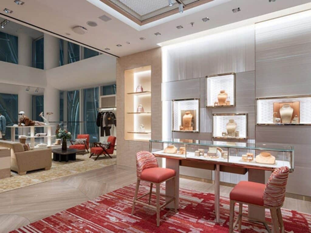 Interior view of the luxury jewelry and accessories section at Louis Vuitton Sanlitun, featuring soft lighting, elegant display cases, and high-end finishes.