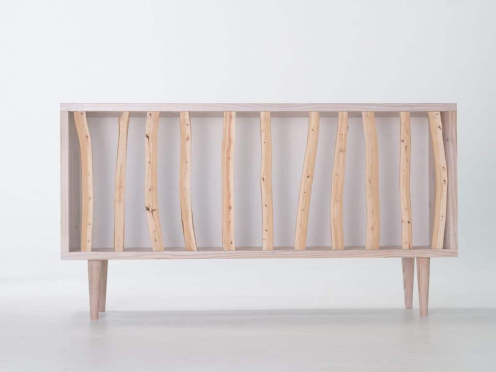 Full frontal view of the Hayashi Cabinet showing the rhythmic pattern of natural wooden slats against a white background.
