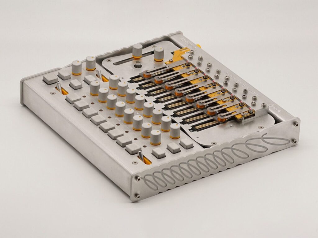 A high-angle perspective of the Korg Phase8 prototype, revealing the internal circuitry and the "AIR" control strip used to adjust the physical vibration response.