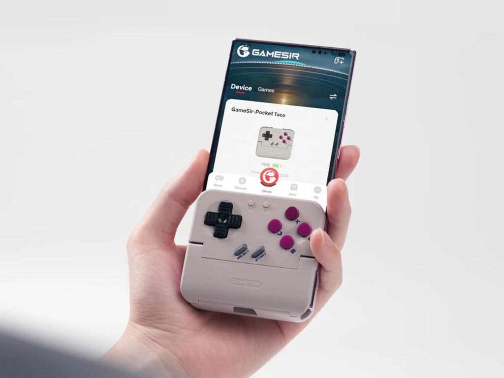 Hand holding a phone with the GameSir app open, showing the Pocket Taco controller settings and battery level.