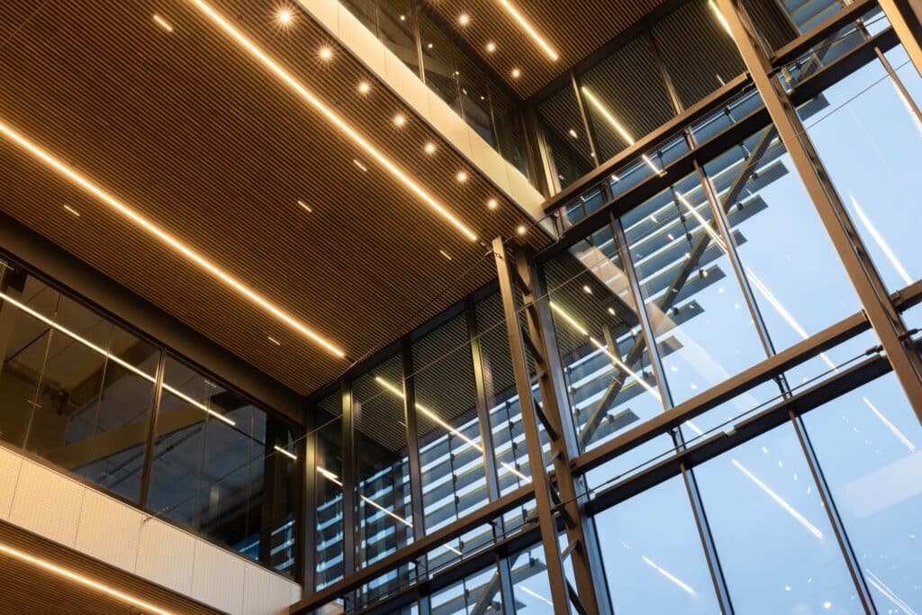 Looking up at the internal timber ceiling and glass skylights of the central atrium in Lagunen II.