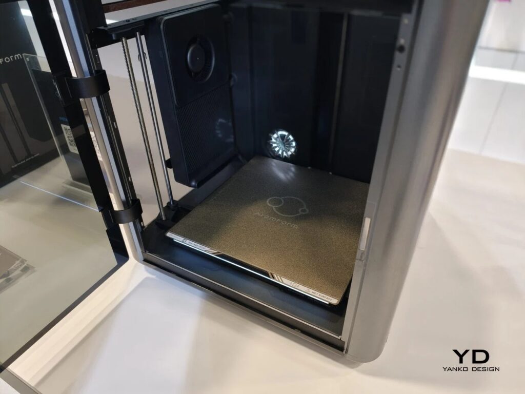 The heated print bed of the AtomForm Palette 300 inside the build chamber.