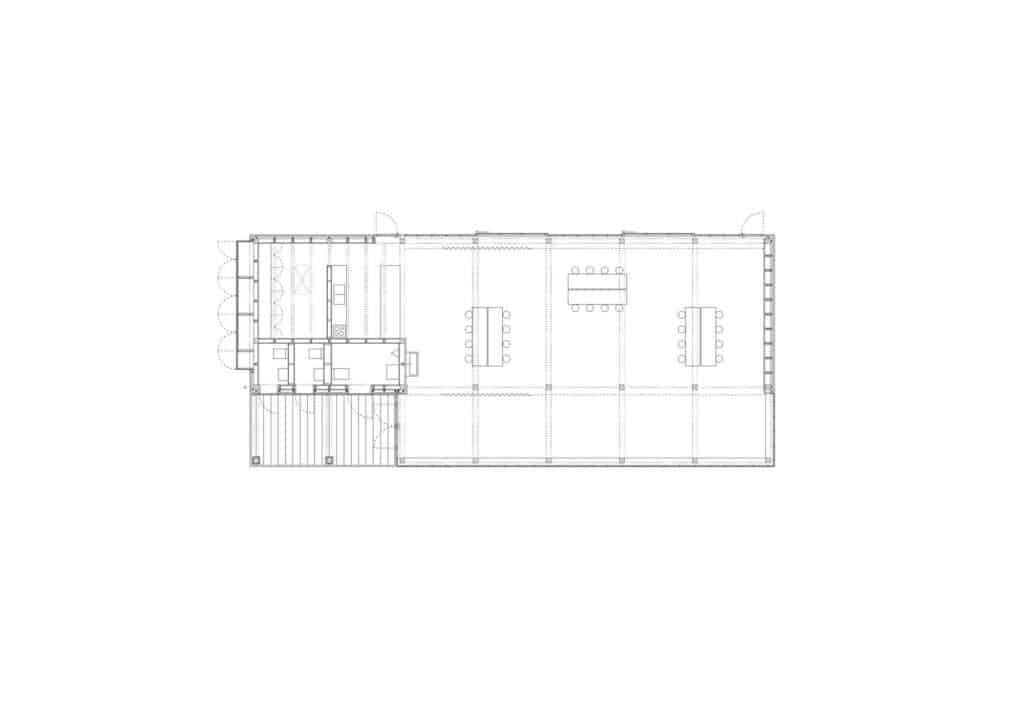 Architectural floor plan of the Climate Pavilion showing the central hall, service blocks, and flexible furniture layout.