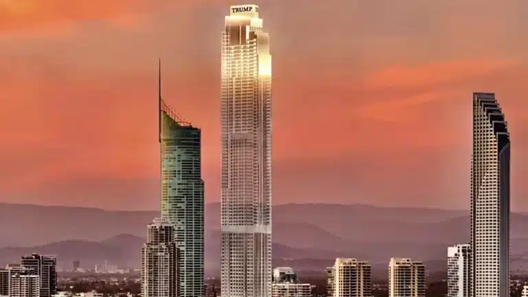 Sunset view of Australia tallest tower concept dominating the Gold Coast skyline with illuminated branding at the crown.
