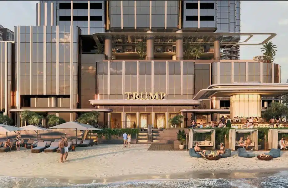  Luxury beachside podium entrance of Australia tallest tower featuring resort amenities and retail frontage.