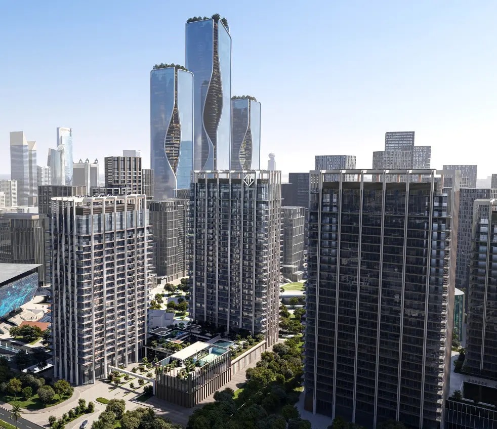 An elevated perspective of the residential towers in Zabeel District, showcasing their integration into the surrounding Dubai skyline at night.