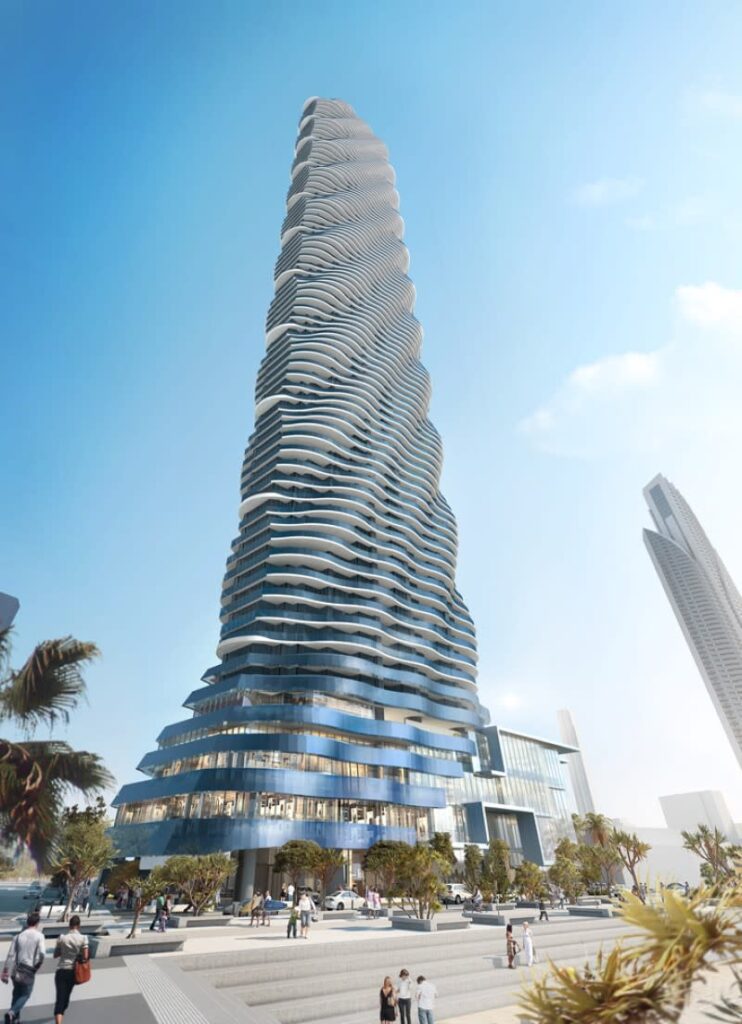 Low angle view of Australia tallest tower showcasing a twisting blue glass fa&ccedil;ade and organic white balconies.