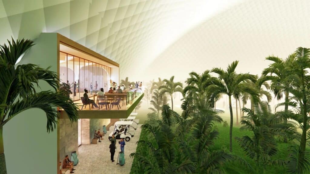 A view of the multi-level driving range inside the Megalodome Indoor Golf Course, with golfers practicing their swing.