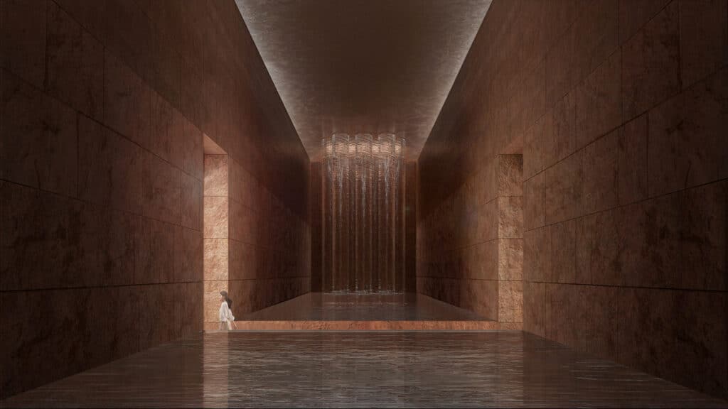 منظر مدخل متحف عماد السيد المسيح، يظهر الهيكل المنخفض وهو ينبثق من المشهد الصخري القاحل في الأردن.