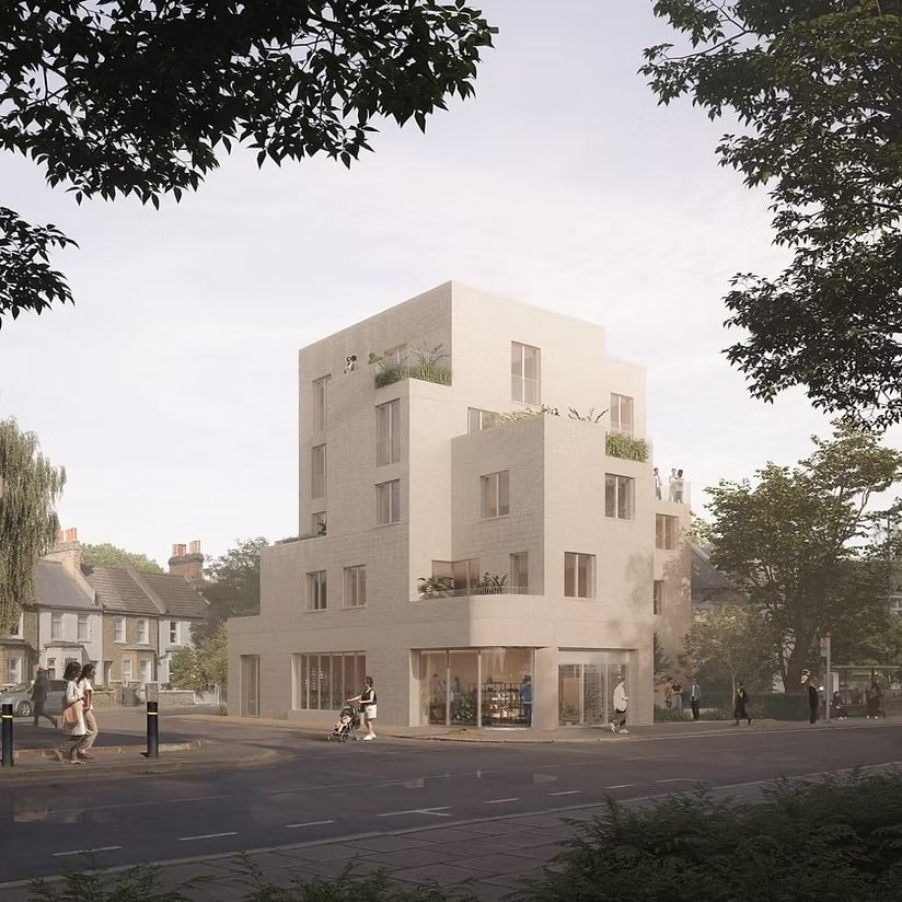 A perspective down the central path of the Streatham housing project, showing the rhythm of repeating facades in this innovative brownfield development.