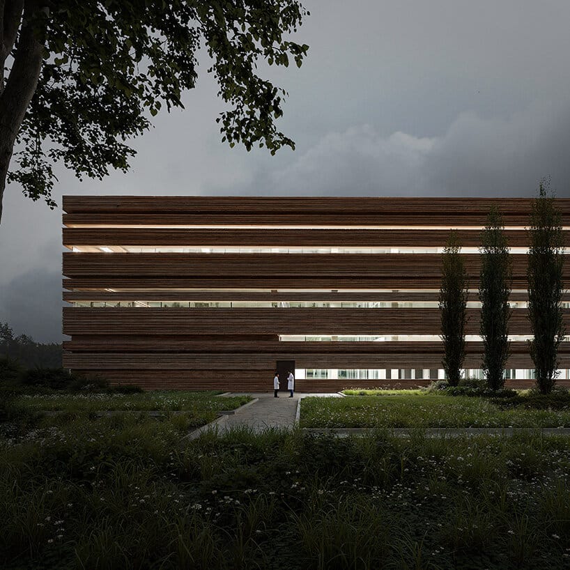 منظر داخلي لمنطقة تخزين المجموعات المرئية، مع خزائن ذات واجهات زجاجية تعرض القطع الأثرية وباحثين يعملون في المكان.