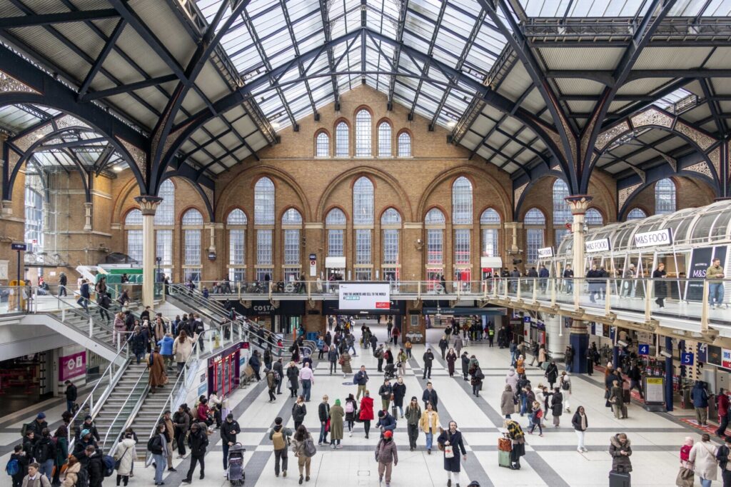 An aerial render of the station proposal, highlighting new green roofs and enhanced public spaces over the tracks.