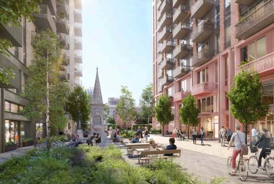 Close-up architectural detail of red brick texture, deep recessed balconies, and metal railings on a modern apartment building.