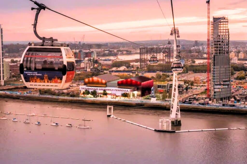 A conceptual rendering of the Troubadour Greenwich Theatre, illustrating its strategic location on the Greenwich Peninsula near the River Thames.