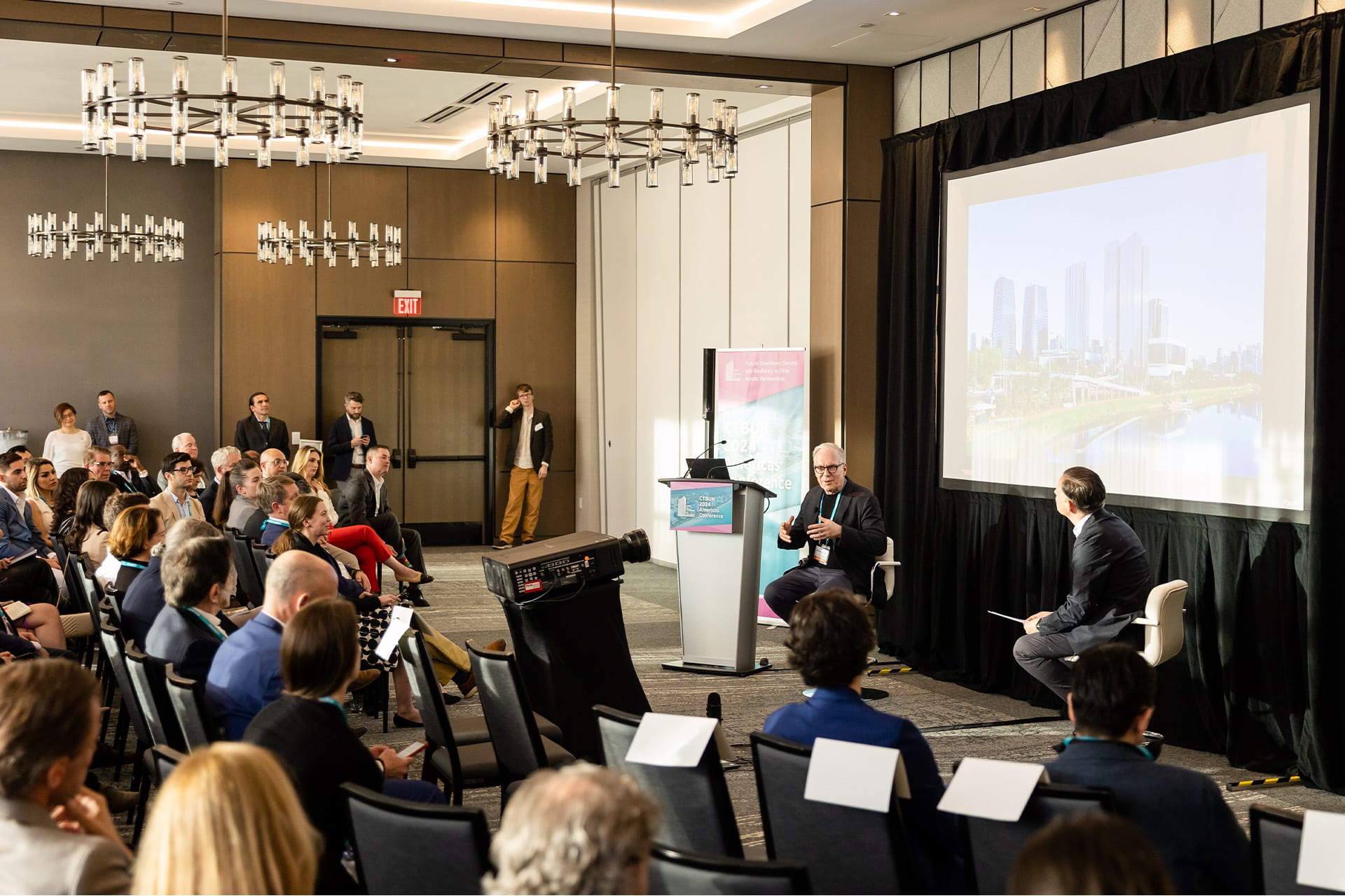 CTBUH 2026 Americas Conference promotional image showing skyscraper city skyline and global tall building forum branding
