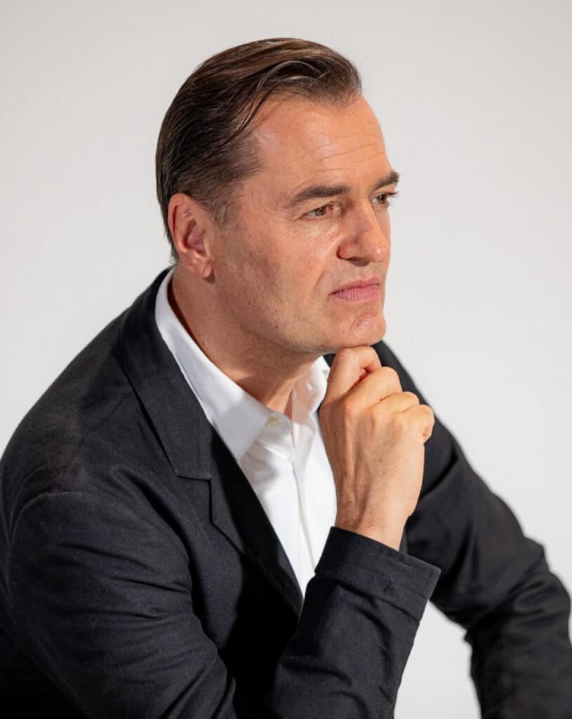 Patrik Schumacher portrait for Kreative Talk 2026 featuring the architect and Zaha Hadid Architects co-director