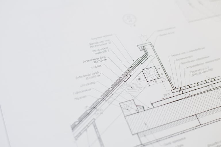 Close-up of a detailed architectural floor plan focusing on technical elements and design specifications.