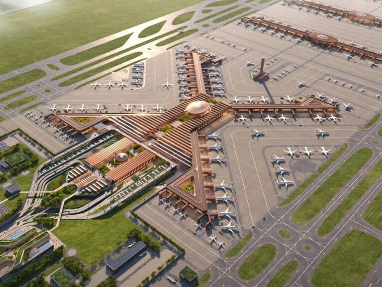 Aerial view of the Bishoftu International Airport master plan showing the cross-shaped terminal design, aircraft runways, and integrated green spaces.