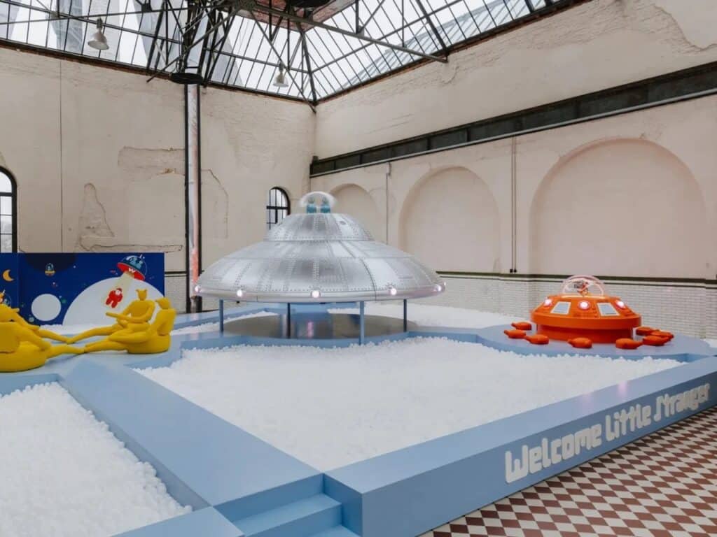 This image highlights the use of soft structures and bold colors to create a "world of its own," reflecting the project's goal of encouraging physical movement and imagination.