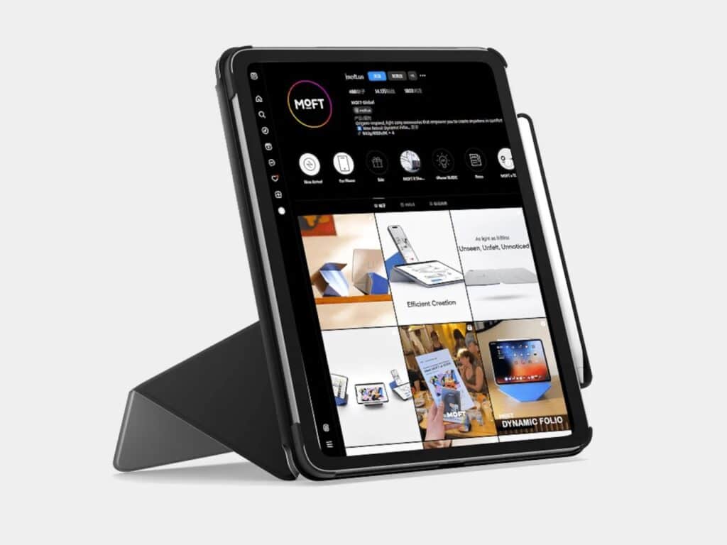 iPad held in a high landscape angle showing a social media profile, with an Apple Pencil attached to the side.