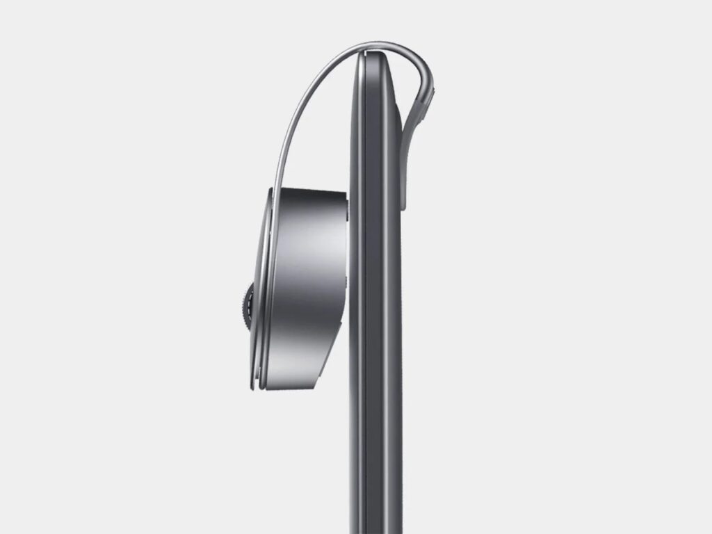 Side view of Bondclip portable mouse attached to the edge of a laptop screen, showing the slim clip mechanism.