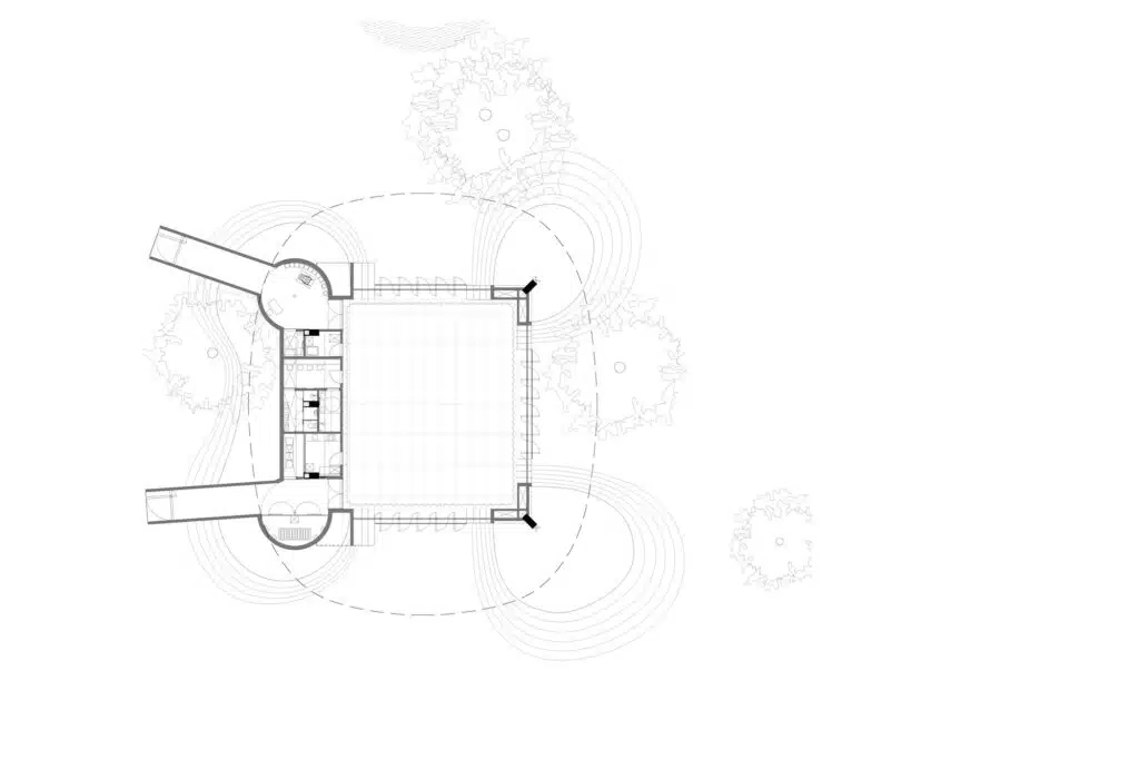 Architectural floor plan of a pavilion showing a central square hall, service areas, and surrounding circular landscape elements.