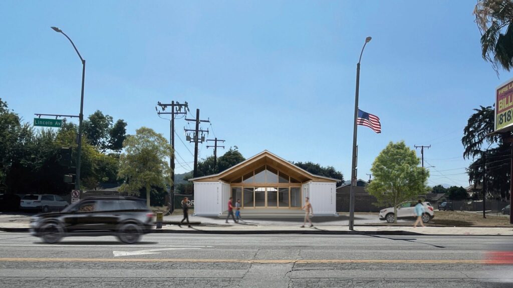 An architectural rendering of a modern community center by Shigeru Ban, featuring a central gabled wooden roof supported by white shipping containers on either side, situated on a street corner in Altadena with people walking in front.