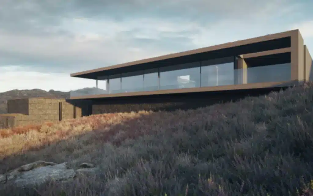 Contemporary Scottish Highlands home with stone base and full-height glazing set into heather-covered hillside at Roshven peninsula