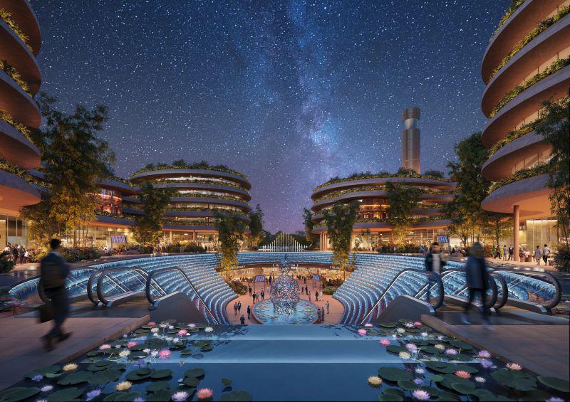 Central water garden courtyard at Gia Binh Airport at night with cascading water features