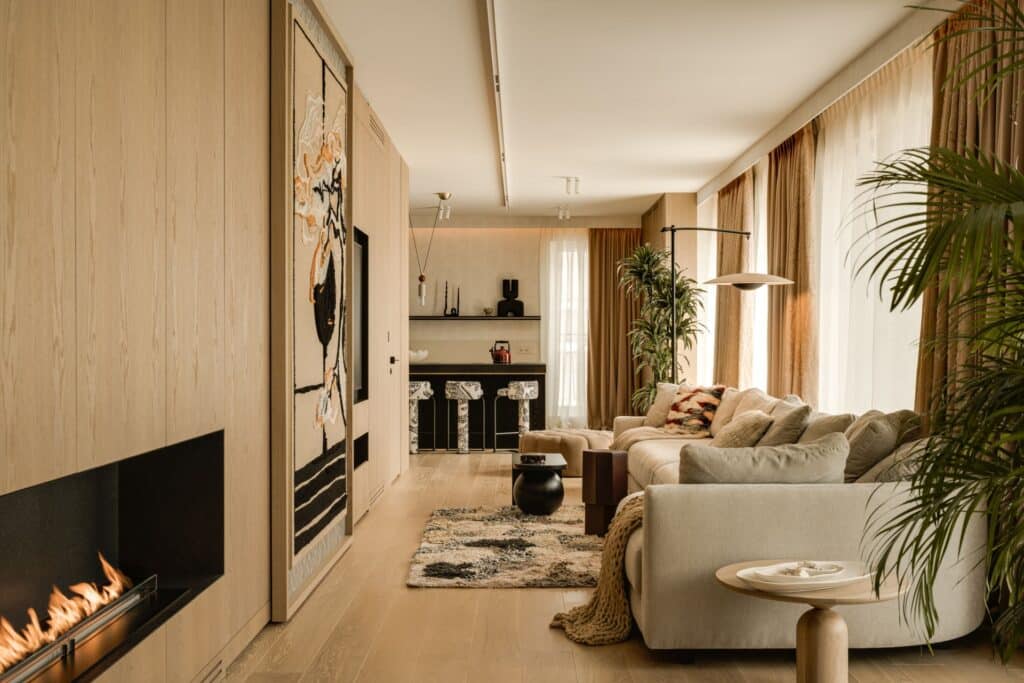 Contemporary dining area in Artistic Powiśle apartment designed by modeko.studio with modern furniture and artistic accents.