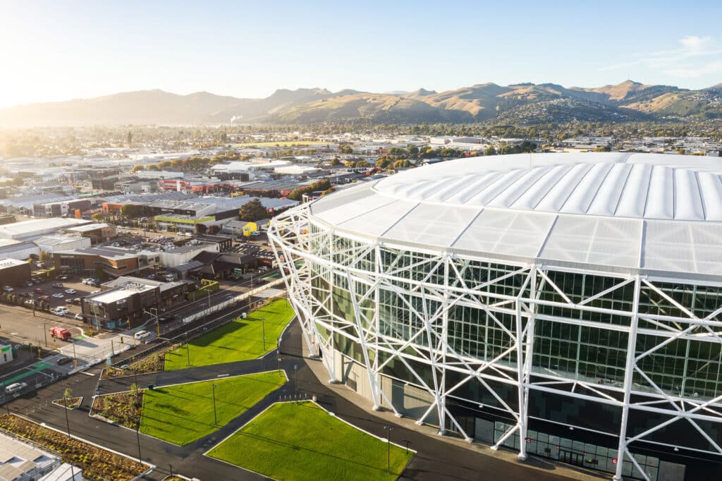 Aerial view of the new multi-use sports venue in New Zealand surrounded by the city landscape