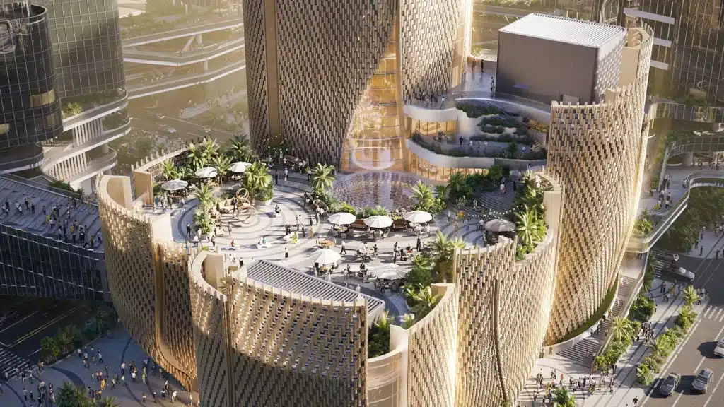 Aerial view of a landscaped rooftop terrace with seating areas and a central glass skylight.