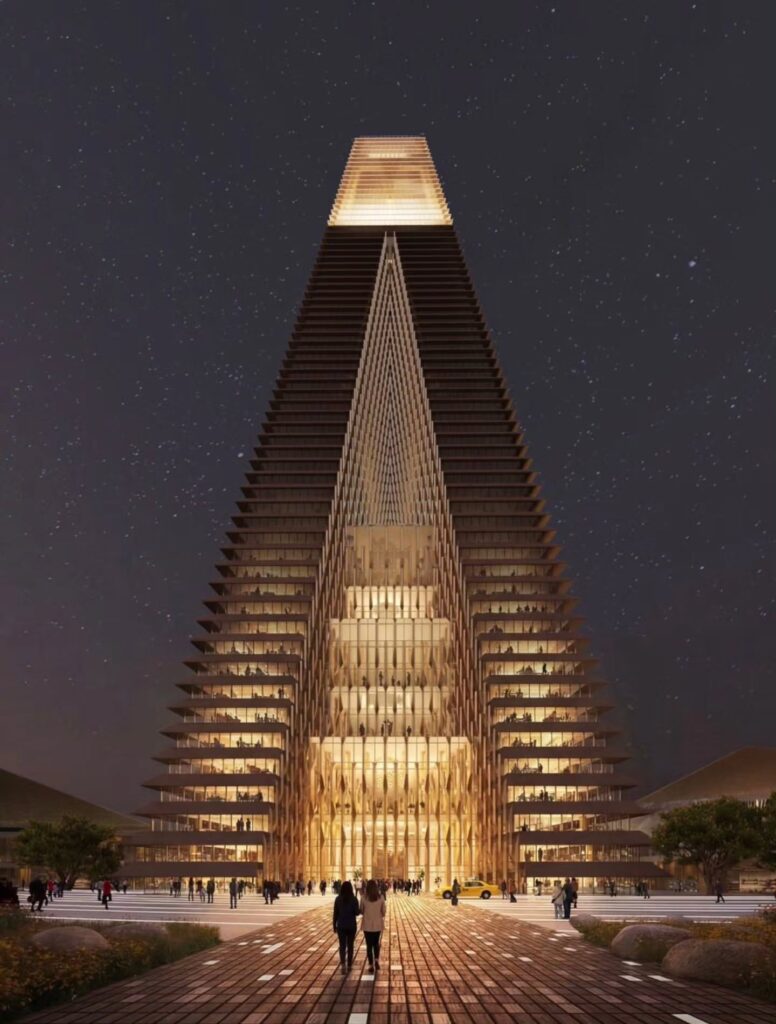 Illuminated central atrium of the main stepped tower at night