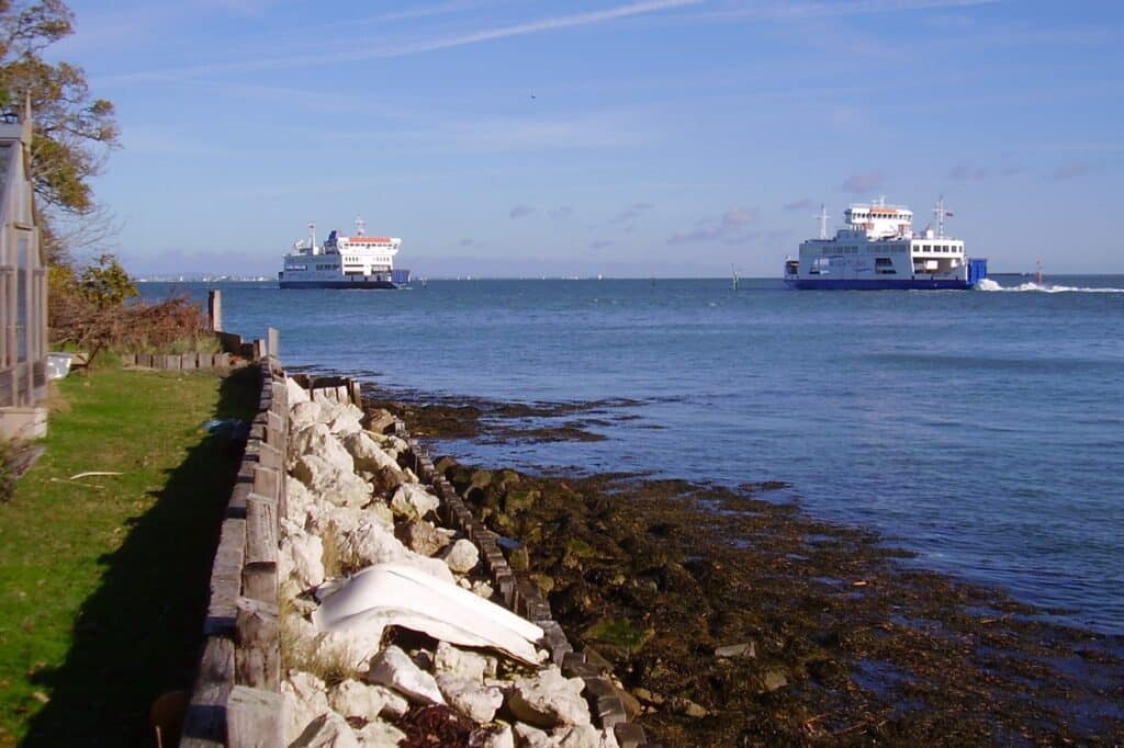 Aerial coastal landscape of The Solent in southern England illustrating the regional maritime environment related to infrastructure and development initiatives.