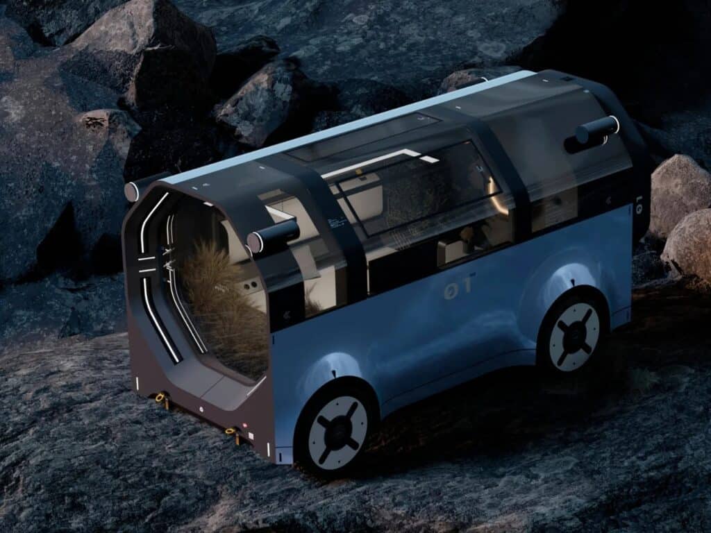 Top-down aerial view of HYTTE mobile cabin showing its transparent glass roof and compact blue body on rocks.