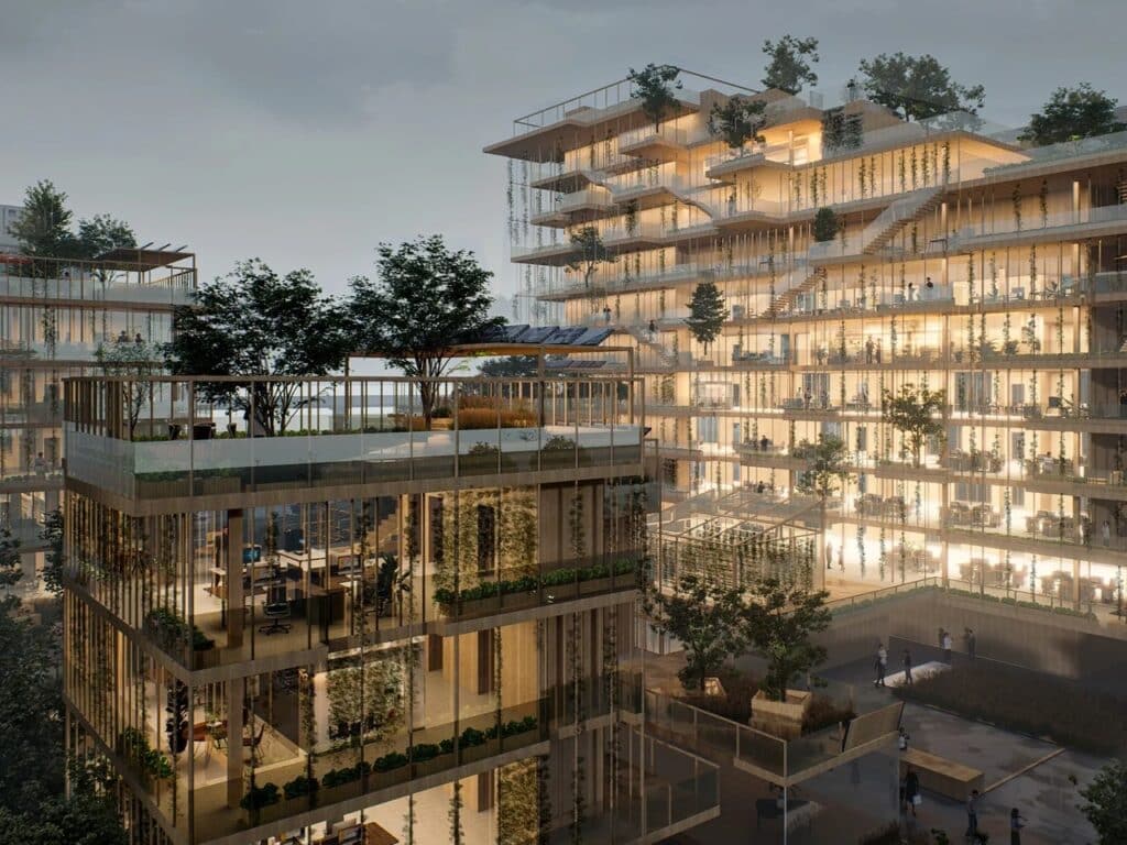 Close-up of the courtyard and stepped terraces of Verdant Syndicate showing solar panels on the roof and vertical planting lines.