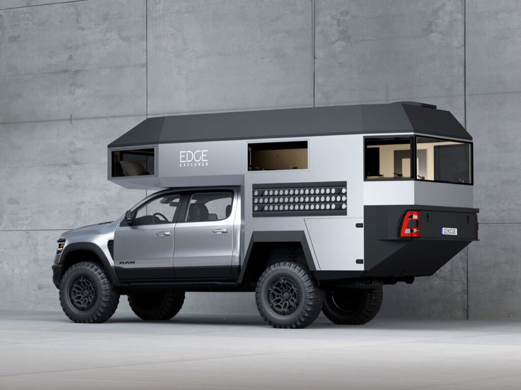 Rear three-quarter view of the EDGE Explorer cabin on a RAM truck, showing the sharp rear departure angle and modern LED taillights.