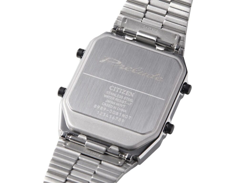 Detailed macro shot of the engraved "Prelude" logo and technical specifications on the watch caseback.