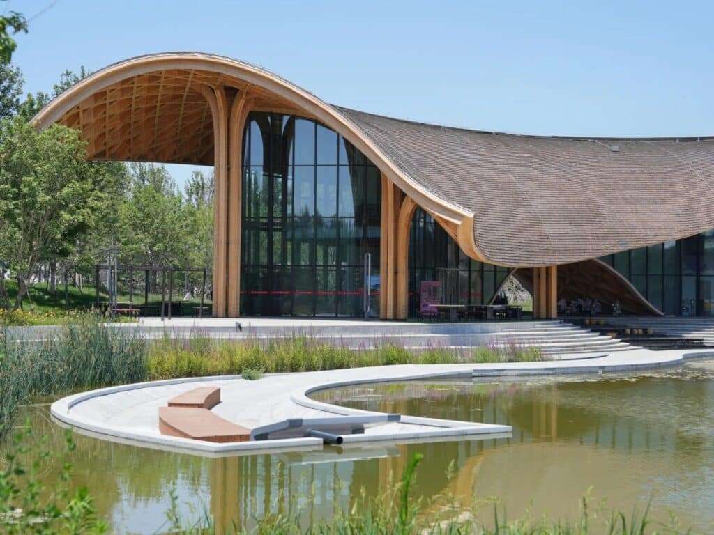 Close-up of the arched entrance and the timber structure of the Silk Road restaurant at the waterfront.