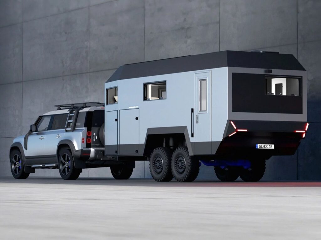 Rear view of the dual-axle EDGE Explorer trailer showing the minimalist door and red LED lighting signatures.