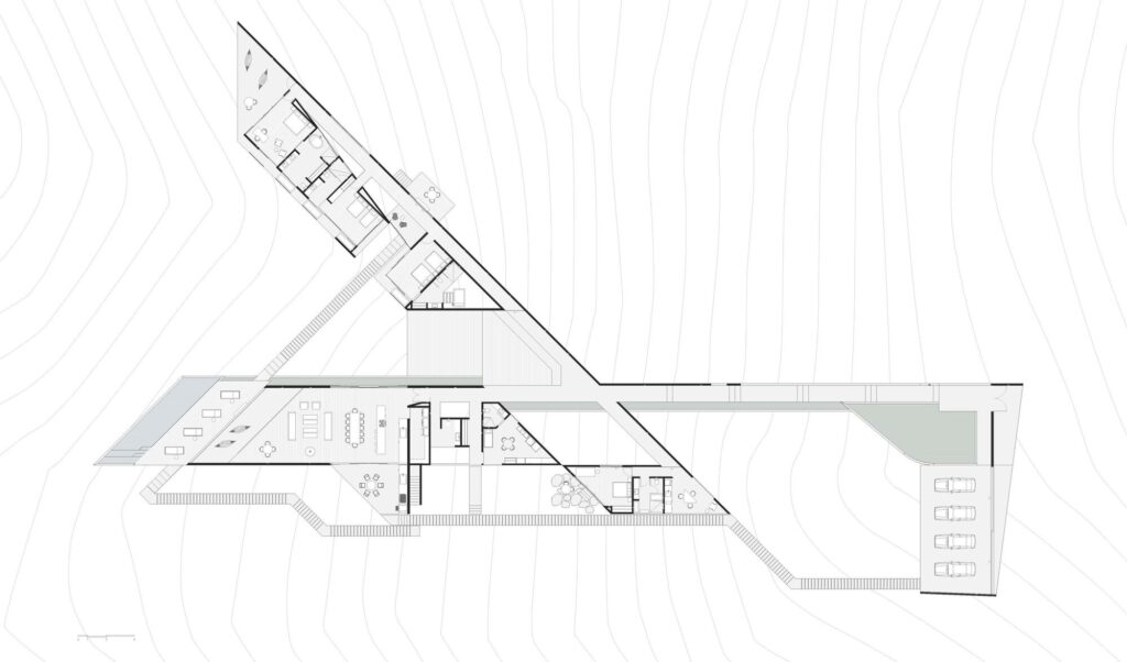 Detailed architectural floor plan of Casa Mavra showing the distribution of social and private wings across the topography.