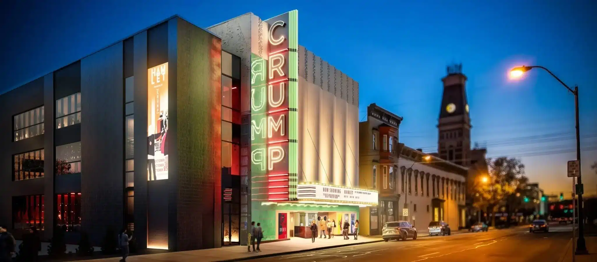 Exterior night view of the Crump Theatre in Columbus, Indiana, showing the 1941 art deco facade and the new eastern expansion by DKGR Architects.