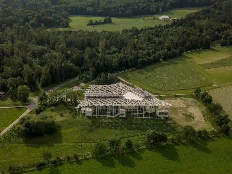 Aerial view of the Jan Michalski Foundation complex integrated into the Swiss countryside landscape