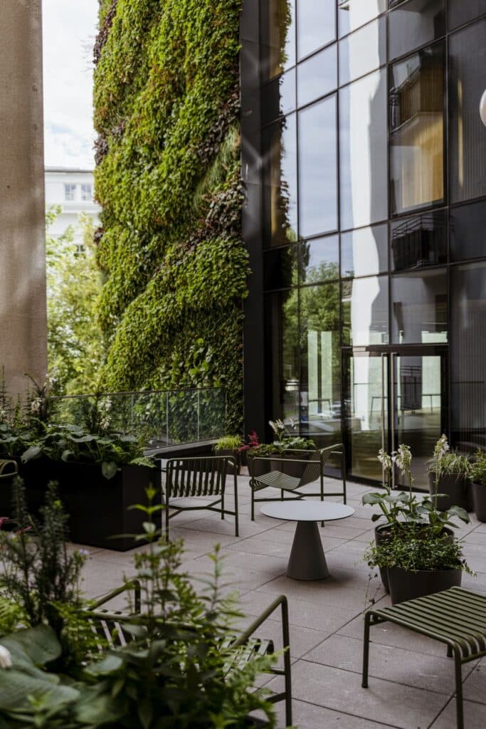 Nobu Hotel Warsaw guest room interior featuring minimalist Japanese-inspired design with warm materials and soft lighting.