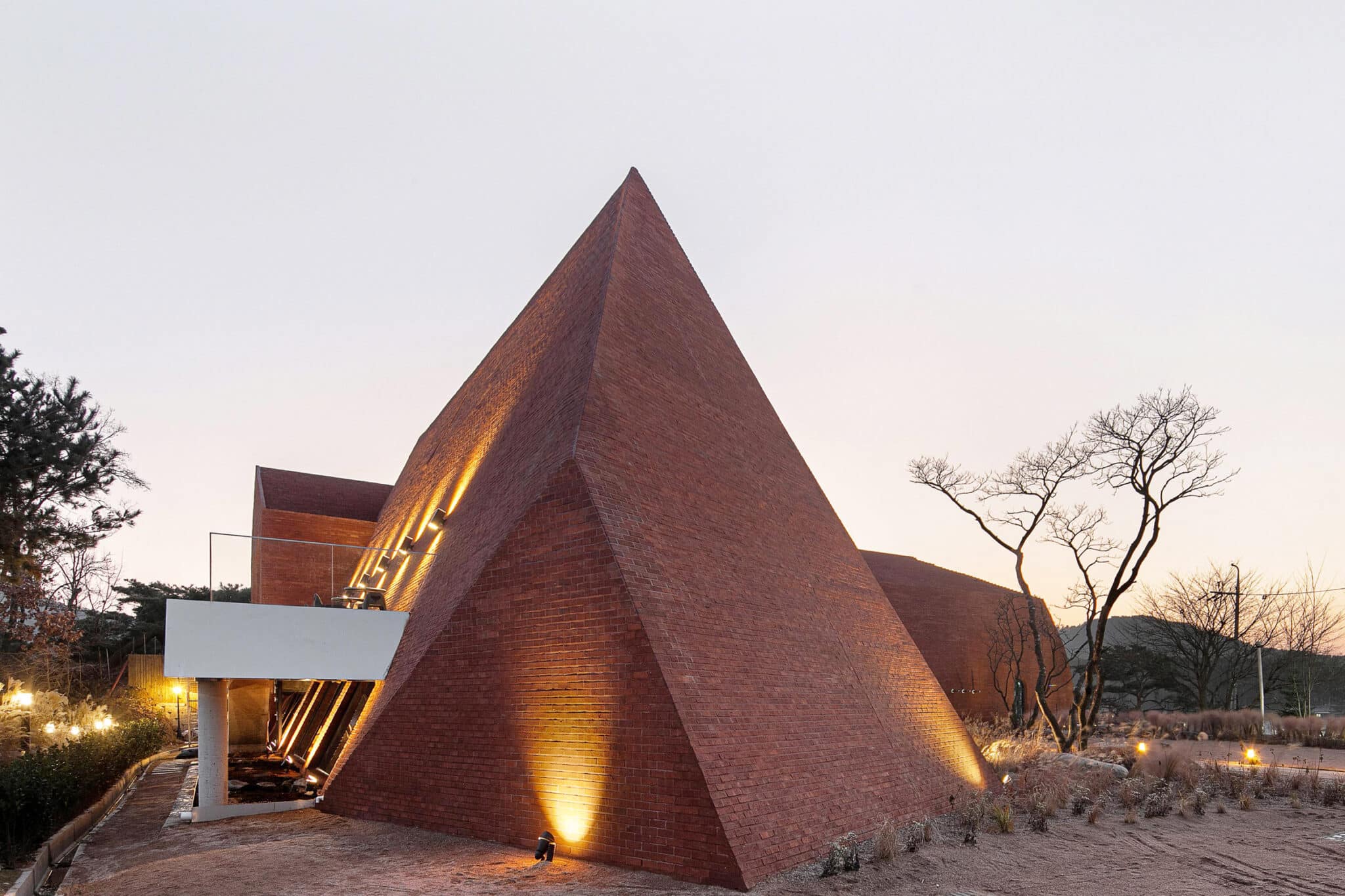 Abogoga cafe angular brick exterior at dusk in Gimpo South Korea