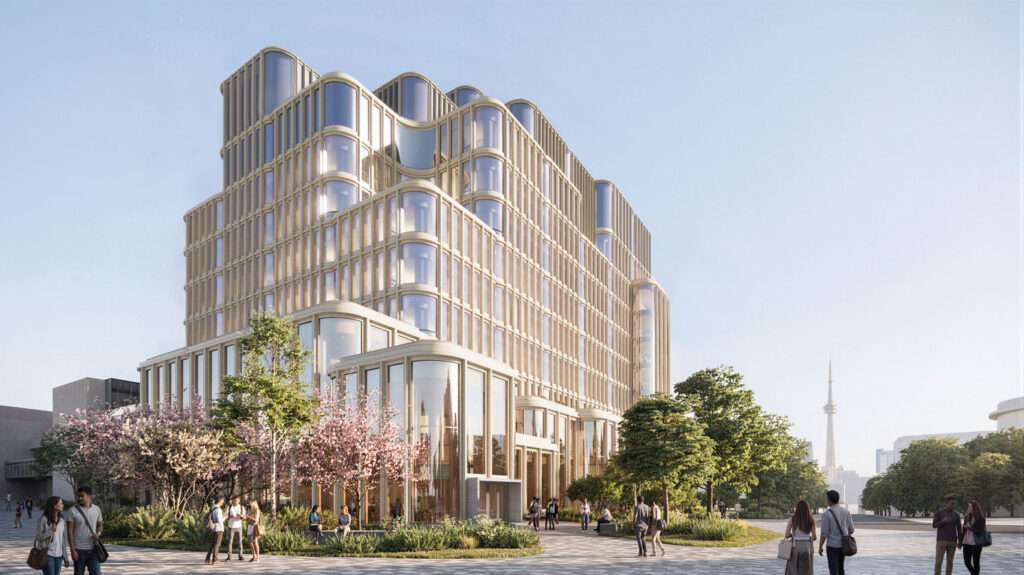 Close-up of the glass and sandstone facade showing vertical articulation.