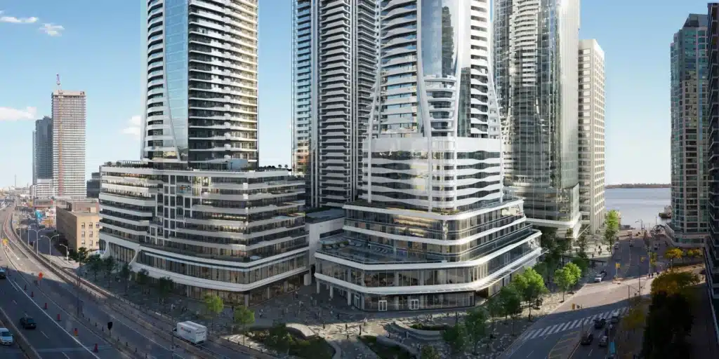 
Pinnacle SkyTower Toronto waterfront construction progress aerial with Lake Ontario background