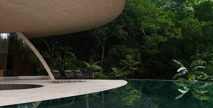 Covered terrace with lounge chairs overlooking a reflective pool and green forest